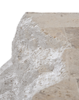 Duna Console Natural Fossil Stone close-up highlighting the irregular sculptural surface, natural pitting and subtle variations in the pale stone finish.
