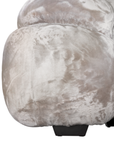 Melo Sofa Lush Pearl close-up highlighting the rounded lower upholstery panel, soft fabric texture and contrasting dark timber-look foot.