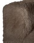 Close up of the Harlow three seater sofa armrest showcasing the plush chocolate faux fur upholstery, rounded profile and soft textured finish.