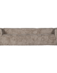 Harlow Sofa three seater upholstered in biscuit faux fur featuring a low profile silhouette, rounded arms and deep cushioned seating shown in a straight front elevation.