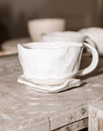 Bloom Ceramic Mug by Uniqwa Collections and PV Pottery, featuring an organic shape and hand-applied dotted detailing.