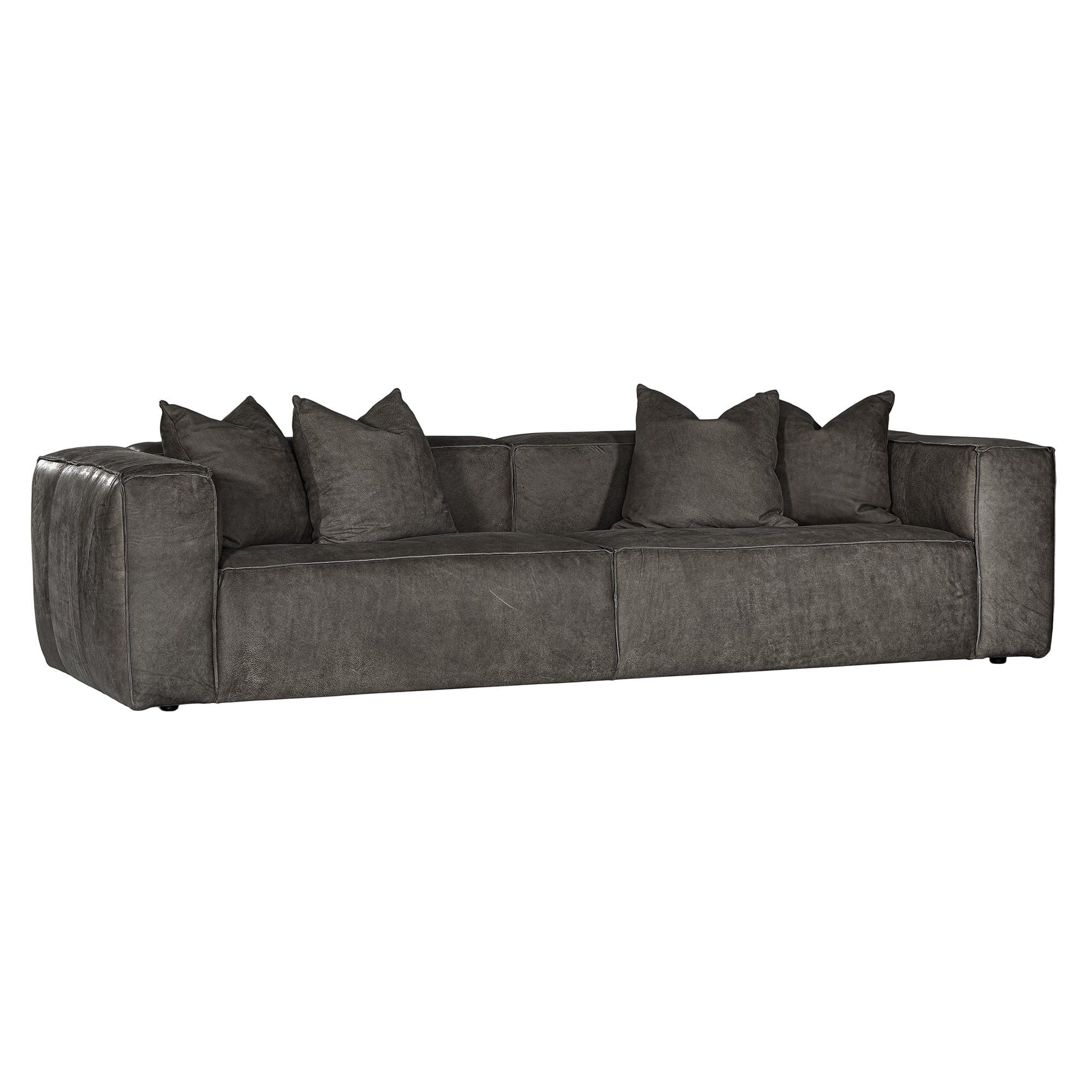 A dark gray upholstered leather sofa with a low, wide silhouette, wide armrests, and six matching throw pillows, shown against a plain white background.