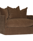 A brown fabric slipcovered armchair with three matching back cushions, shown against a plain white background.