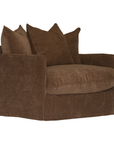 A brown upholstered armchair with a skirted base, wide armrests, and three matching back cushions, shown on a plain white background.