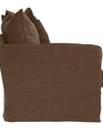 A brown upholstered armchair with a textured fabric, featuring a matching brown throw pillow and a side slipcover, shown against a plain white background.