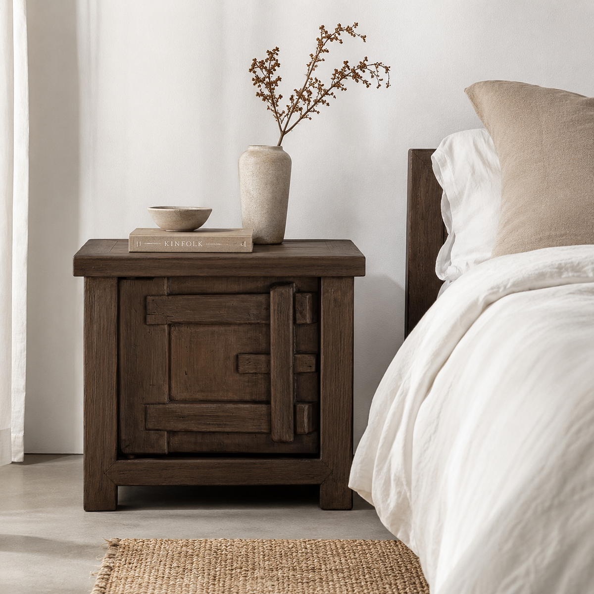 Bulu Bedside in Chocolate Elm styled beside a neutral bed with natural linen, sculptural ceramics and warm earthy accents.
