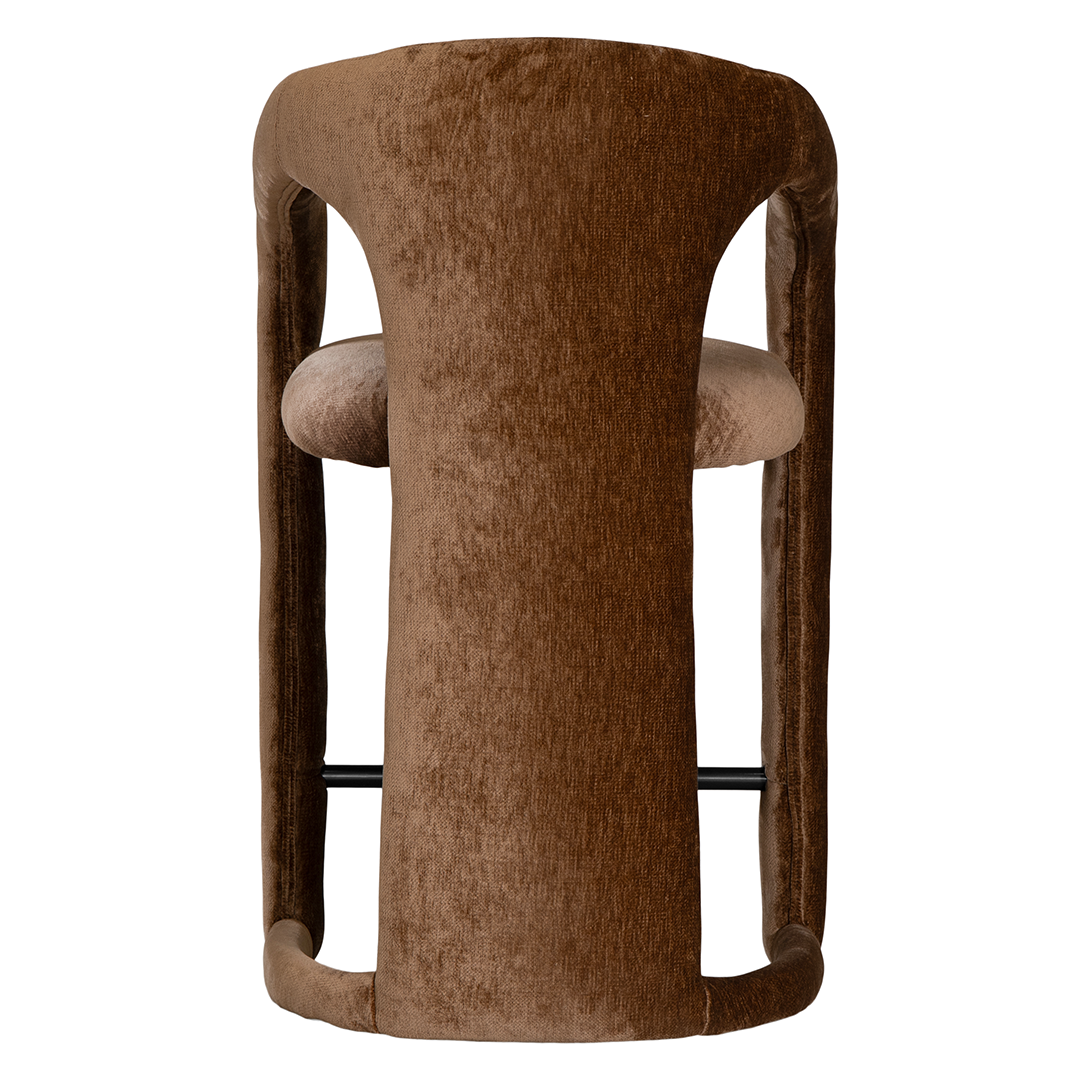 Fikile barchair in bronze with a curved upholstered frame, rounded backrest and integrated footrest detail.