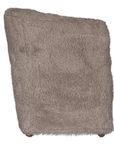 Side view of the Hamilton Dining Chair upholstered in biscuit faux fur showcasing the curved profile and fully upholstered design.