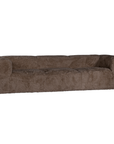 Perspective view of the Harlow three seater sofa upholstered in chocolate faux fur with oversized cushions, rounded arms and a low profile silhouette.