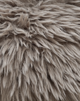 Close up detail of the Harlow Sofa one seater showcasing the long pile biscuit faux fur upholstery with a soft, richly textured finish.