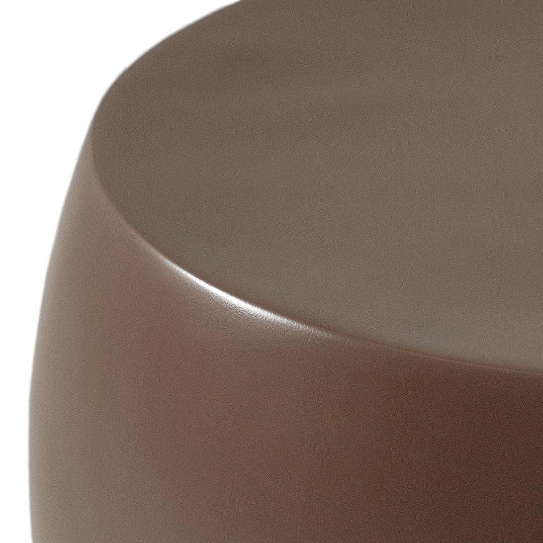Santorini side table in chocolate featuring a smooth rounded sculptural form with a wide flat top and softly curved silhouette.
