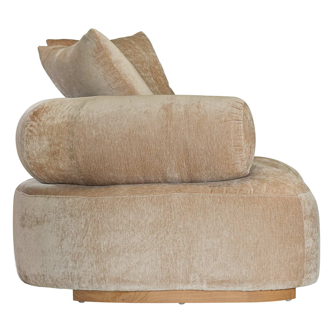 Soneva one seater sofa in dolce fabric featuring a soft curved silhouette with round bolster cushions and plush back pillows.