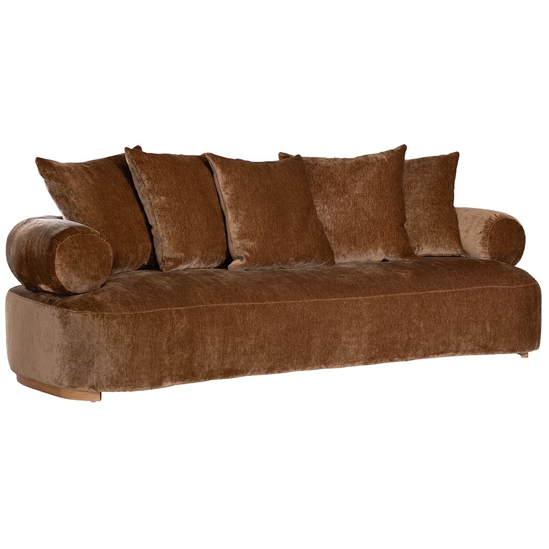 Soneva three seater sofa in bronze fabric featuring a soft curved silhouette with round bolster cushions and plush back pillows.