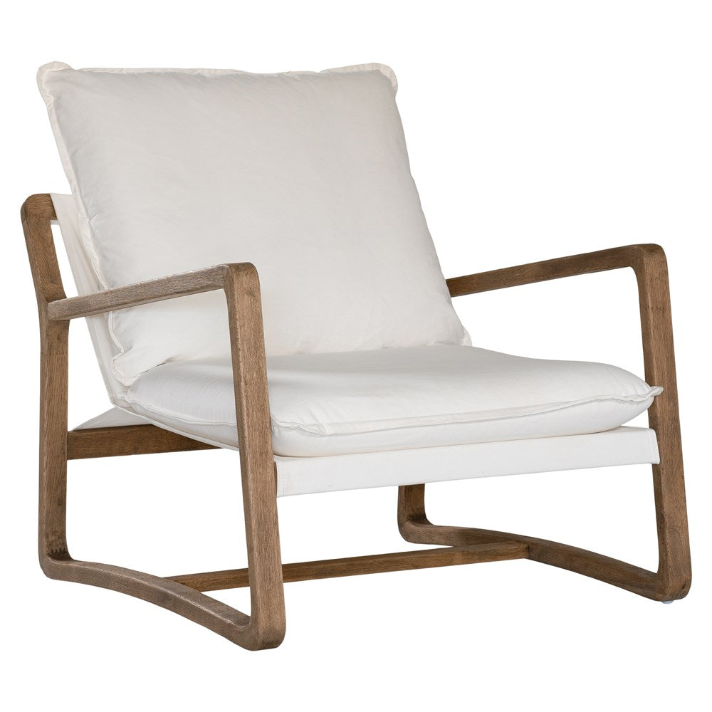Barbuda Occasional Chair by Uniqwa Collections featuring white cushions and a curved driftwood frame in a relaxed resort-style silhouette.
